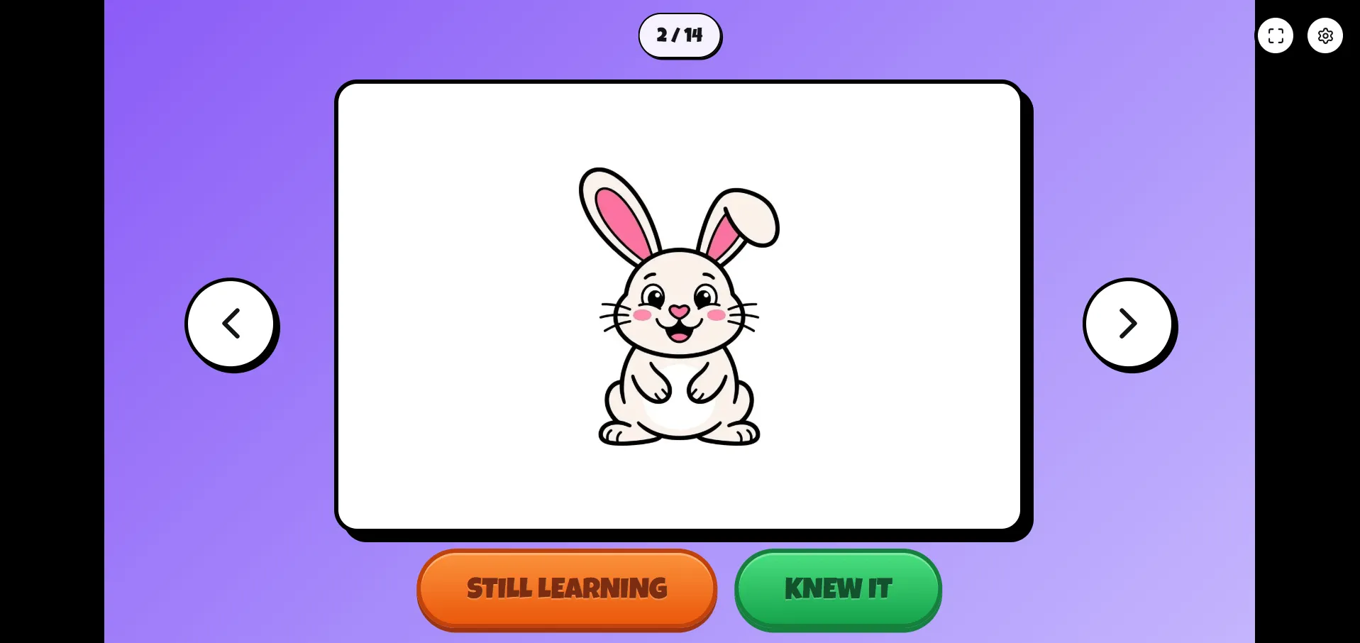 Flashcards game screenshot — flip card showing a cartoon bunny with Still Learning and Knew It self-assessment buttons